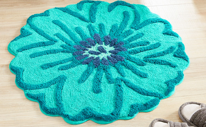 The Pioneer Woman Flower Round Teal Bath Rug on the floor