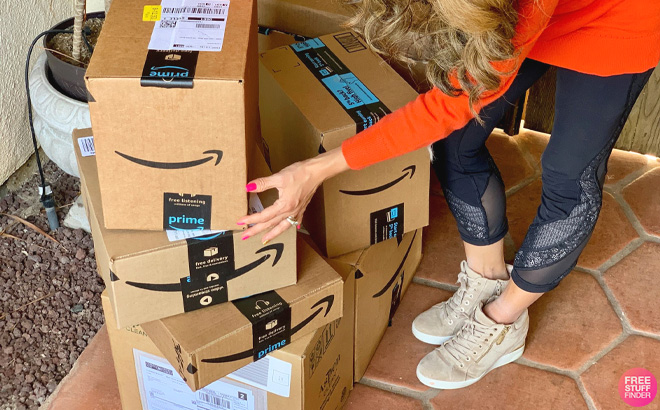 Tina organizing Amazon shipping boxes