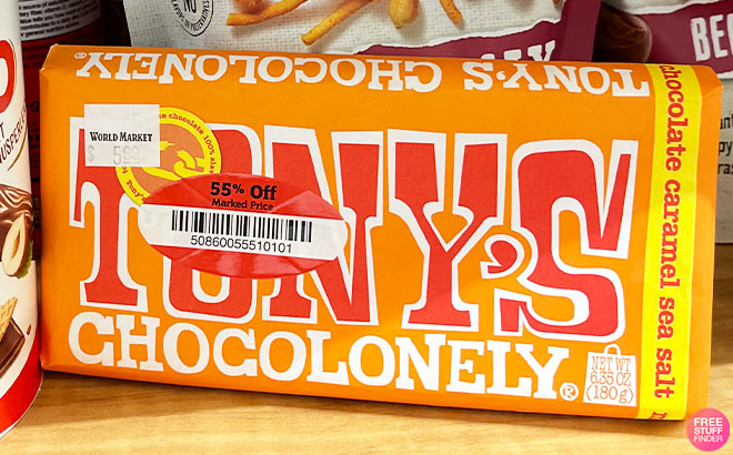 Tonys Chocolonely Caramel Sea Salt Milk Chocolate Bar on a Shelf