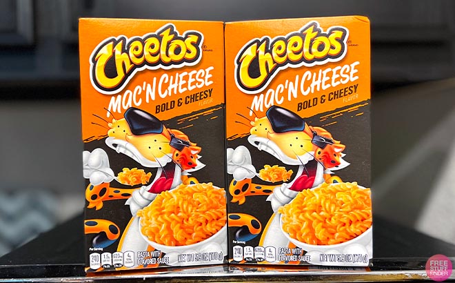 Two Cheetos Mac and Cheese on table