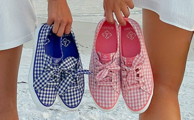 Two Person Carrying Two Different Colors of Sperry Womens Crest Vibe Gingham Sneakers