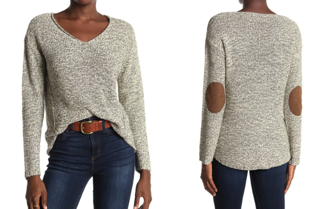 Woman is Wearing a V Neck Faux Suede Elbow Patch Tunic Sweater in White Beach color