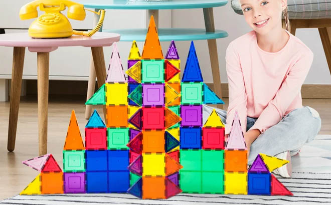 a Girl Beside a PicassoTiles 101 Piece Mini Magnetic Building Set