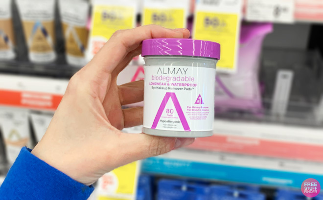 a Hand Holding Almay Makeup Remover Pads