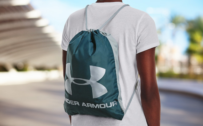 a Person Carrying an Under Armour Ozsee Sackpack