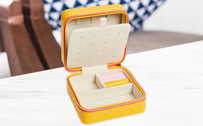 A Square Zip Jewelry Box on the Table