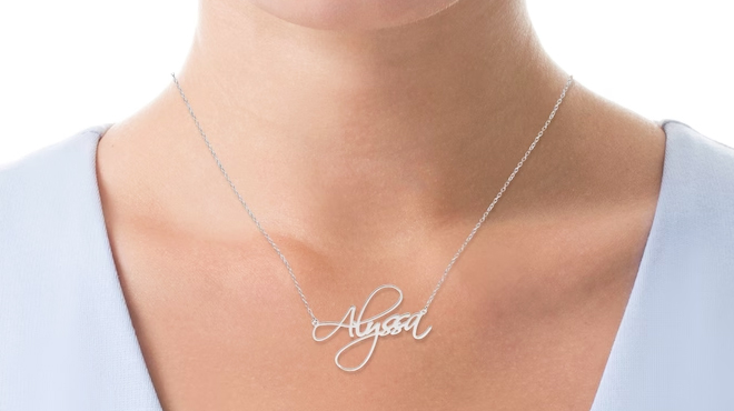 A Woman Wearing Zales Personalized Cursive Name Necklace in Sterling Silver