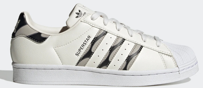 Adidas Womens Superstar Shoes on a Gray Background