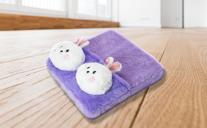 Animal Slippers Foot Pillow in Rabbit Design on the Floor
