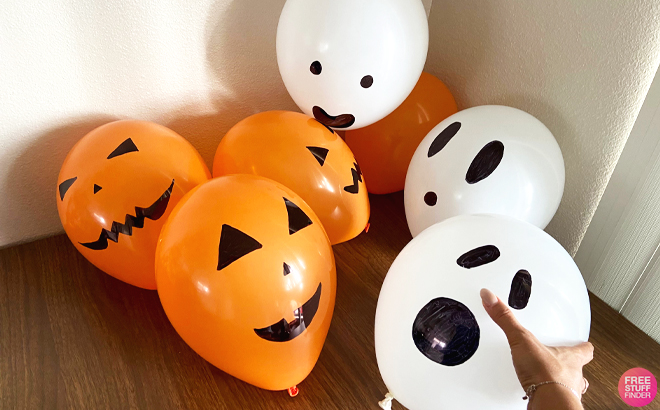 Balloons with Spooky Faces Drawn on Them