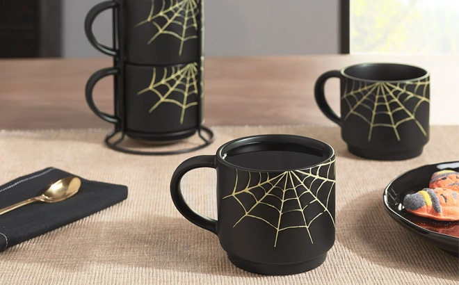 Black Spider Web Glazed Ceramic Stacking Mug Set with Metal Rack on the Table