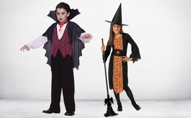Boys Vampire and Girls Witch Halloween Costumes on a Gray Background