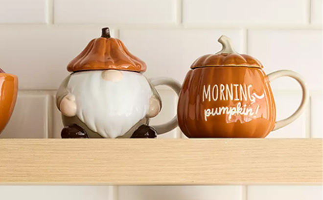Celebrate Together Fall Harvest Gnome Mug on the Left Side and Fall Morning Pumpkin Mug on the Right Side Celebrate Together Fall Harvest Gnome Mug on the Left Side and Fall Morning Pumpkin Mug on the Right Side