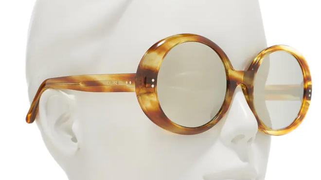 Celine Jackie O Polarized Oval Tortoise Oversized Sunglasses on a Mannequin