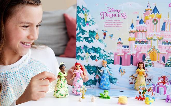 A Child Playing with the Disney Princess Advent Calendar