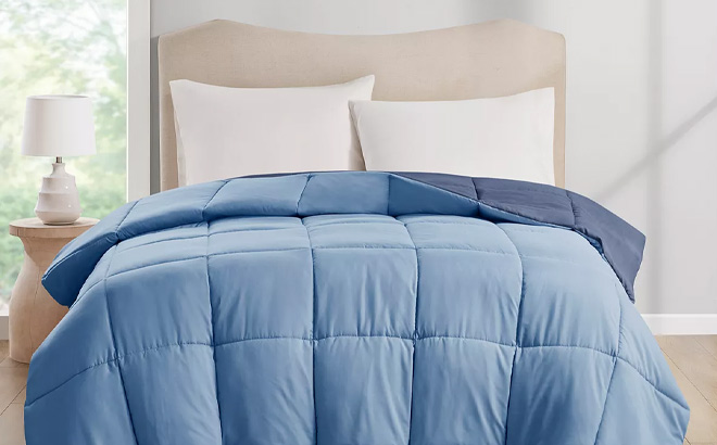 Easy Care Reversible Comforters in Blue Color on Bed
