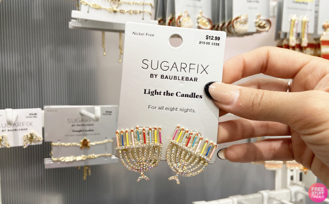 HAnd Holding Sugarfix by Baublebar Light the Candles Earring