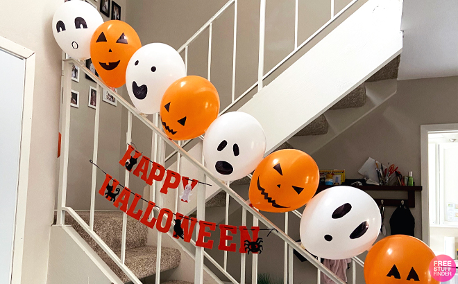 Halloween Balloons Arranged on a Railing