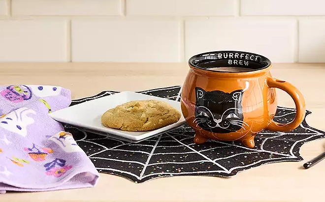 Halloween Glitter Spiderweb Placemat on a Countertop Halloween Glitter Spiderweb Placemat on a Countertop
