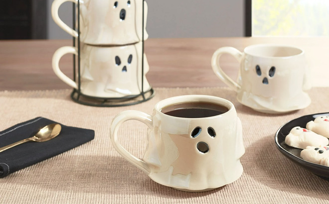 Halloween White Ghost Shaped Glazed Ceramic Stacking Mug Set with Metal Rack on the Table