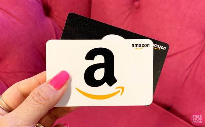Hand Holding Amazon Gift Cards