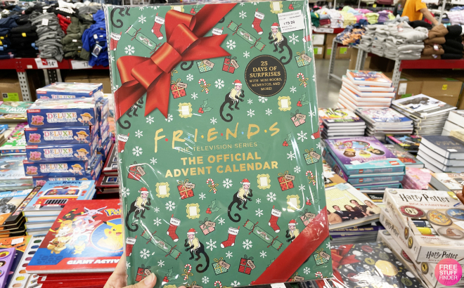 A Hand Holding Friends The Official Advent Calendar at a Store