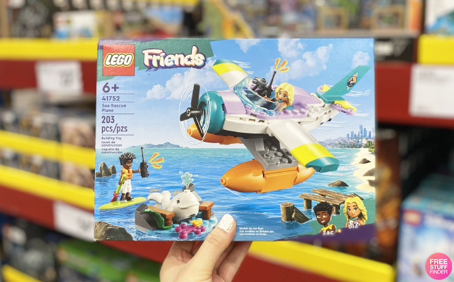 Hand Holding LEGO Friends Sea Rescue Plane Building Set