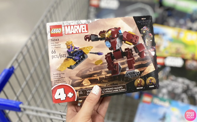 Hand Holding LEGO Marvel Iron Man Hulkbuster vs Thanos Building Set
