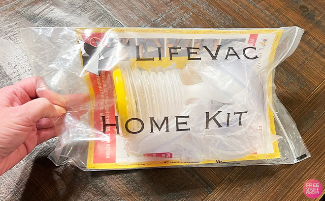 Hand Holding LifeVac Choking Rescue Kit