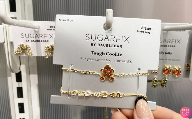 Hand Holding Sugarfix by Baublebar Tough Cookie Charm Bracelet Set