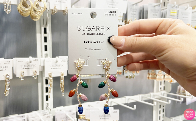 Hand Holding Sugarfix by Baublebar Lets Get Lit Earrings