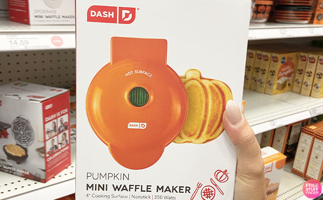 Hand Holding a Dash Pumpkin Mini Waffle Maker