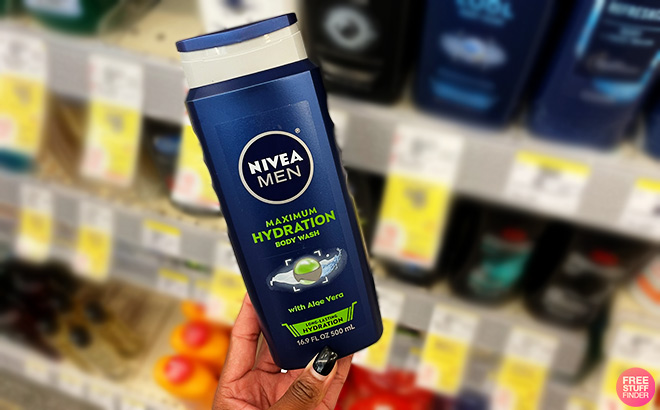 Hand Holding a Nivea Men Body Wash in a Store Aisle