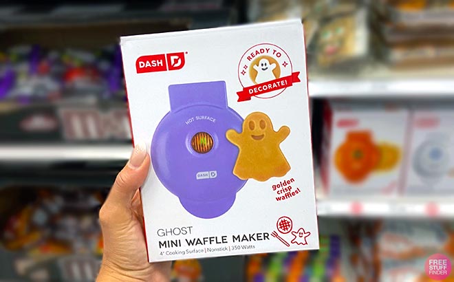 Hand holding Dash Ghost Nonstick Mini Waffle Maker