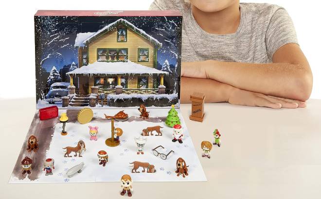 Jakks Holiday a Christmas Story Advent Calendar on a Tabletop with a Child in the Background