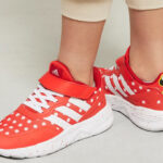 Kid Wearing Adidas Nebzed X Disney Minnie Mouse Shoes