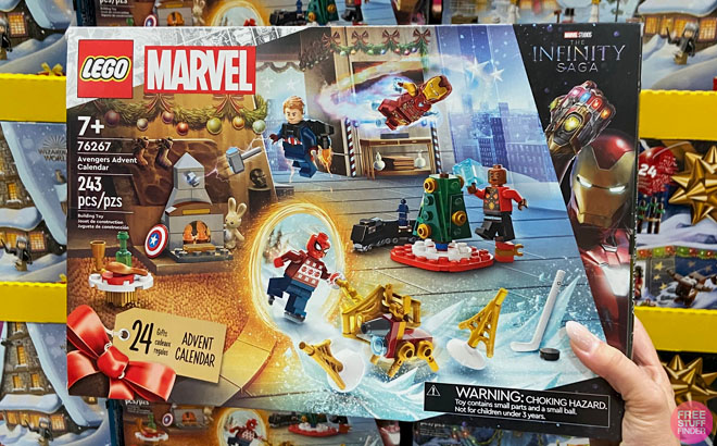 A Hand Holding the LEGO Marvel Avengers 2023 Advent Calendar at a Store