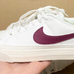 Person Holding Nike Court Legacy Next Nature Womens Shoes