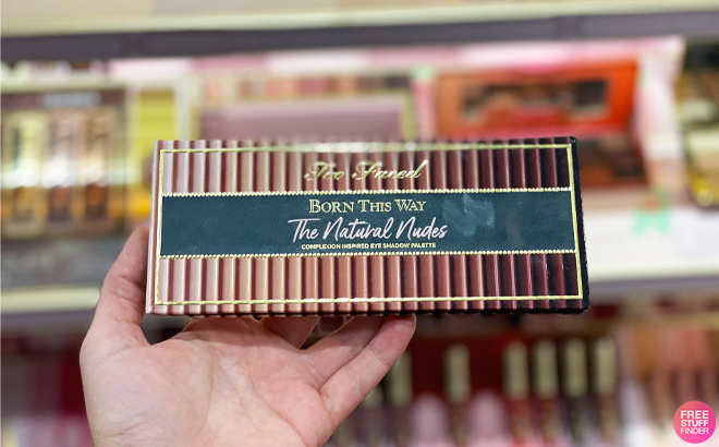 Person Holding the Too Faced Born This Way The Natural Nudes Eyeshadow Palette