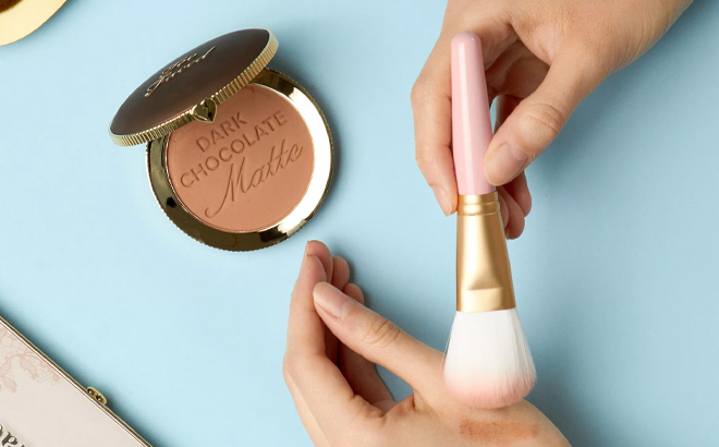 Person Using Too Faced Chocolate Soleil Matte Bronzer Powder Brush Set Person Using Too Faced Chocolate Soleil Matte Bronzer Powder Brush Set