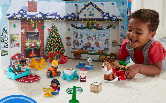 Toddler Playing with Fisher Price Little People Chirstmas Advent Calendar