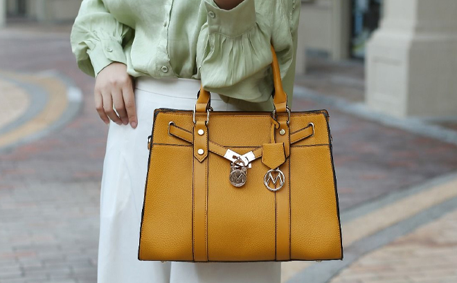 Woman Holding MKF Christine Vegan Leather Satchel Handbag Woman Holding MKF Christine Vegan Leather Satchel Handbag