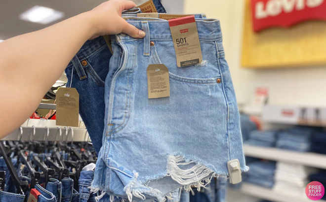 Woman Holding a Levis 501 Shorts