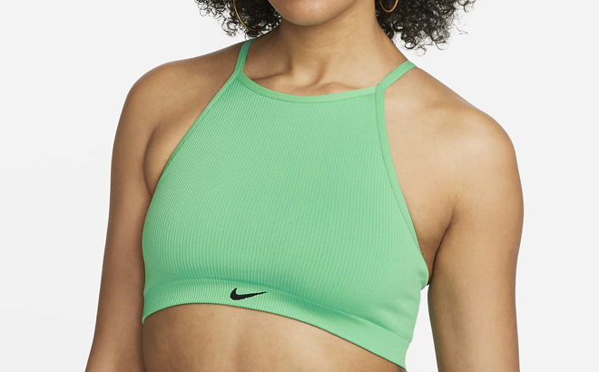 Woman Wearing Nike Indy Seamless Ribbed Light Support Non Padded Sports Bra Woman Wearing Nike Indy Seamless Ribbed Light Support Non Padded Sports Bra