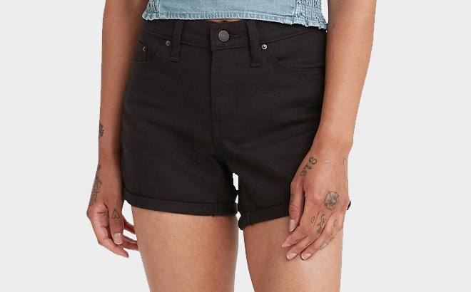 Woman is Wearing Levis Womens Denim Shorts in Black Color