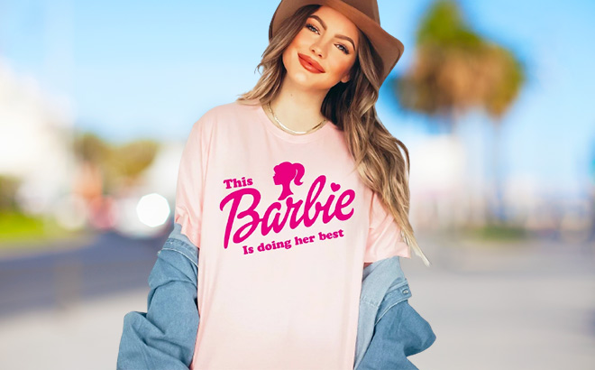 Woman is Wearing a Barbie Personalized T Shirt in Pink Color