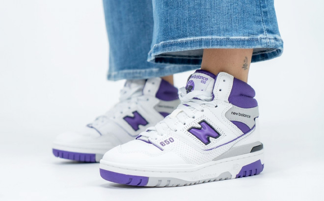 Woman is Wearing a New Balance 650 in White with Interstellar and Raincloud Color
