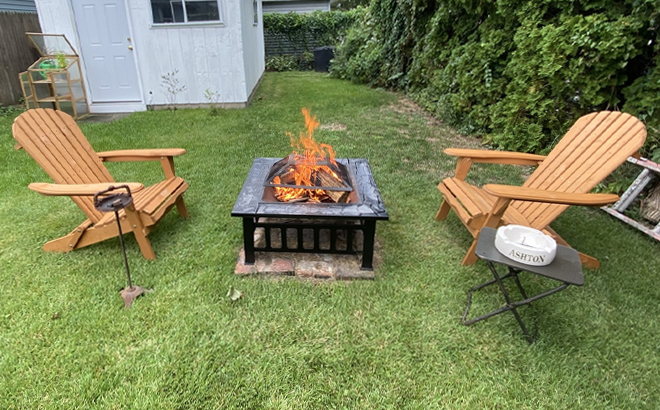 Wooden Folding Adirondack Chairs Next to a Fire Pit