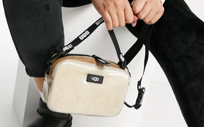 a Woman Holding UGG Clear Bag
