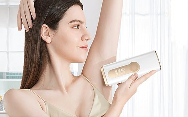 a Woman Using an IPL Laser Hair Remover